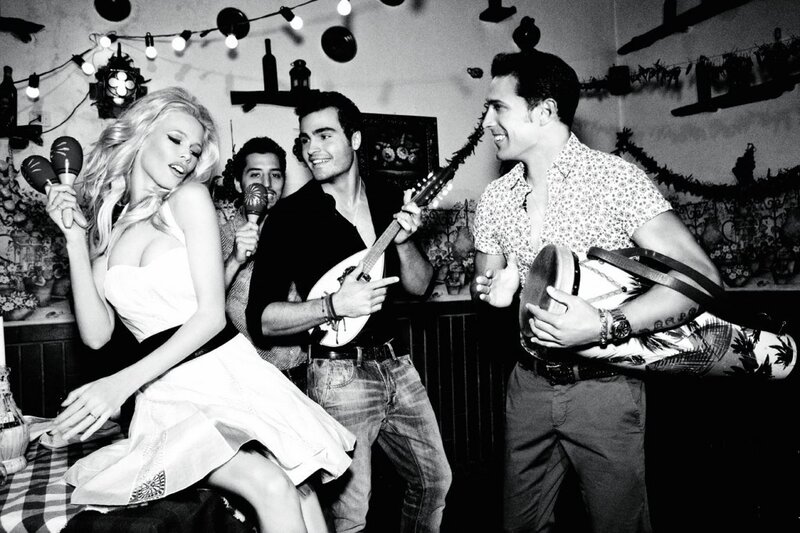Woman and Men Playing Music