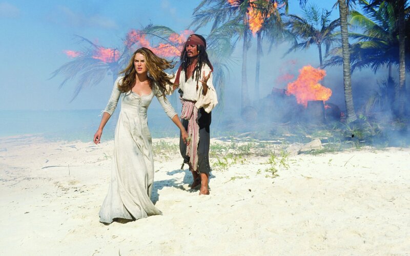 Woman and Pirate on Beach