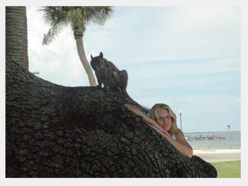 Woman and Squirrel on Tree