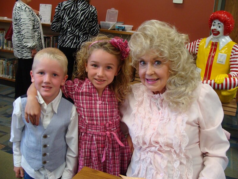 Woman and Two Children — Pink