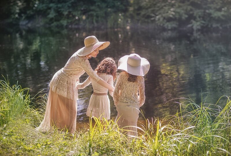 Woman and Two Girls by River