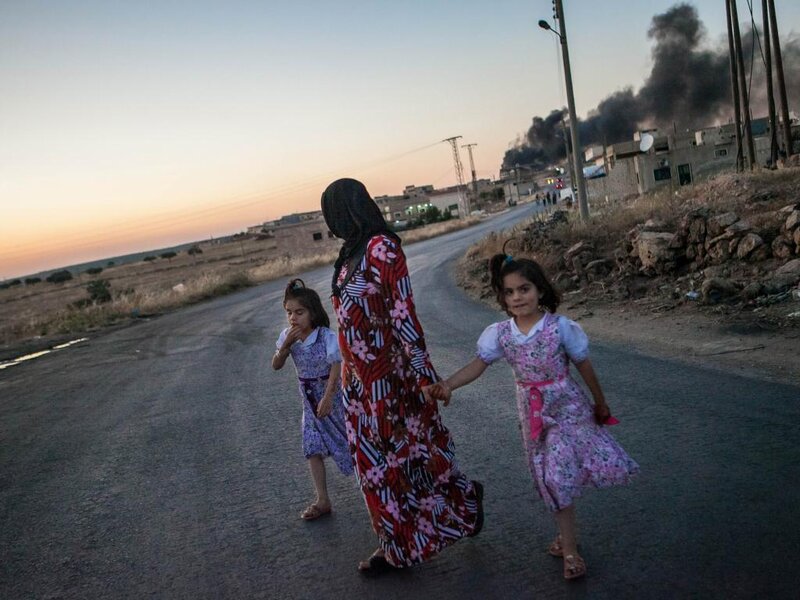 Woman and Two Girls Walking