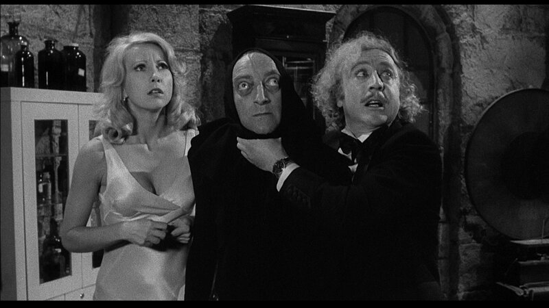 Woman and Two Men in Cellar