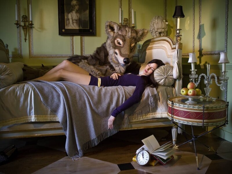 Woman and Wolf on Bed