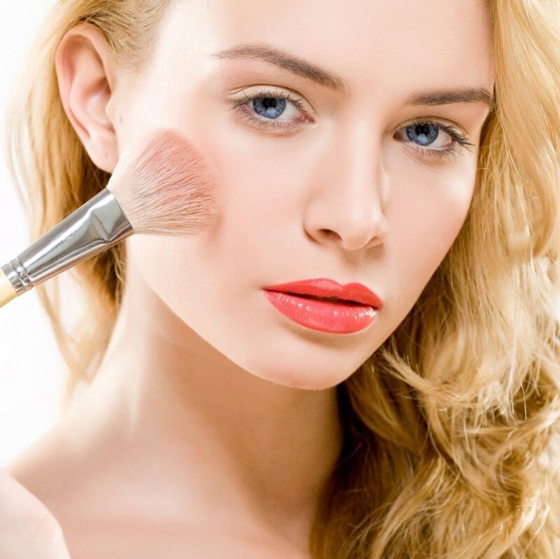 Woman Applying Blush — Blonde