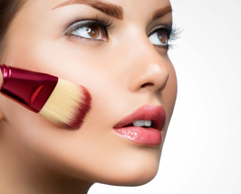 Woman Applying Blush