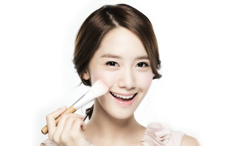 Woman Applying Blush — White