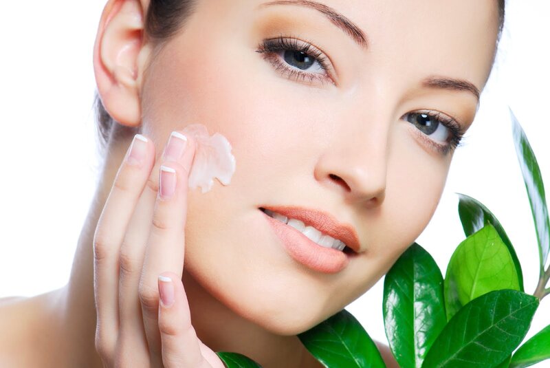 Woman Applying Cream — White