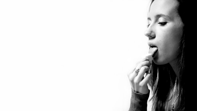 woman applying lip balm