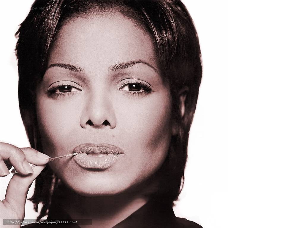 woman applying lip gloss