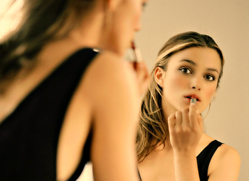 Woman Applying Lipstick — Beige