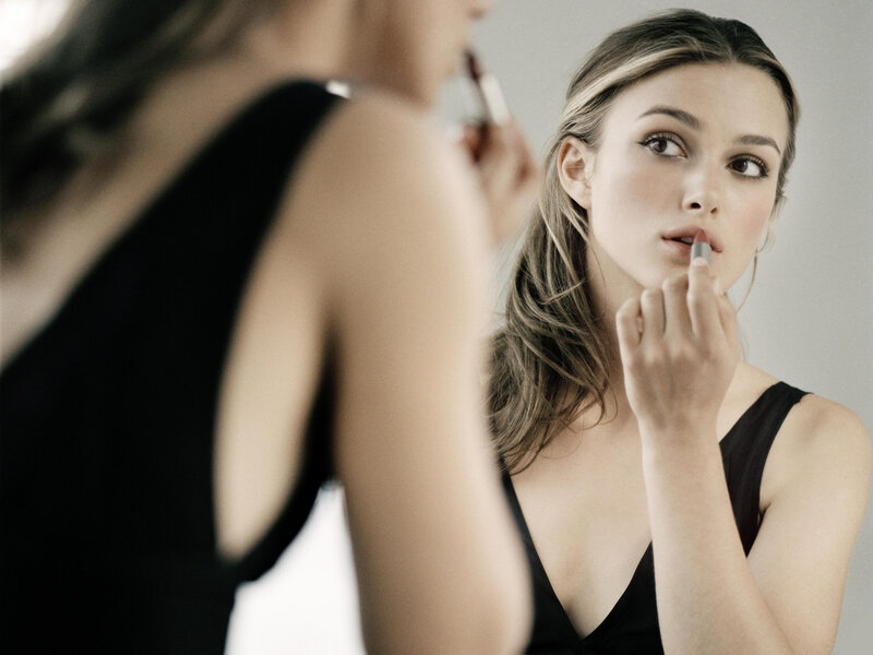 Woman Applying Lipstick — Black, Calm