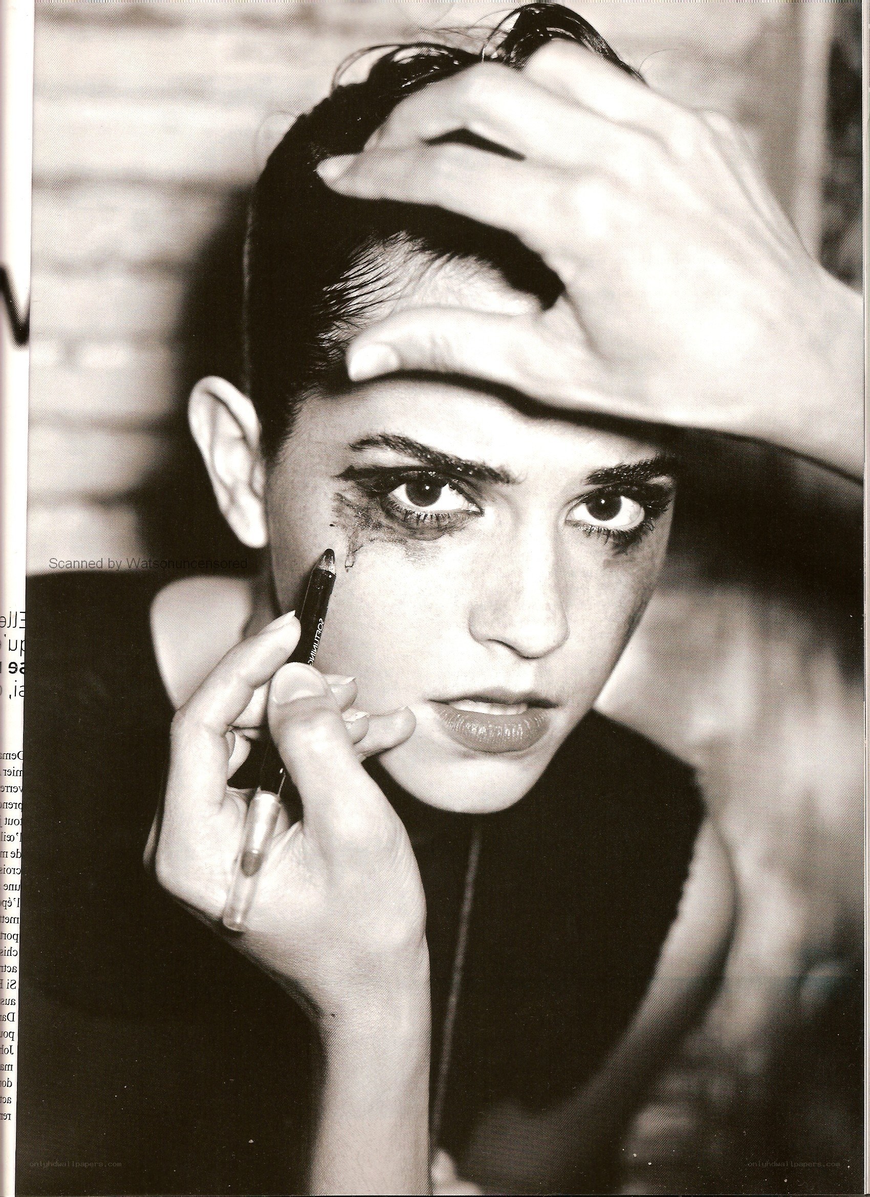 woman applying makeup