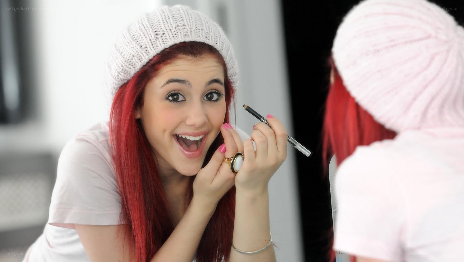woman applying makeup