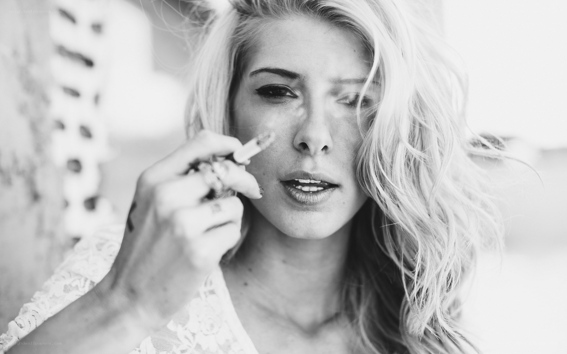 woman applying makeup