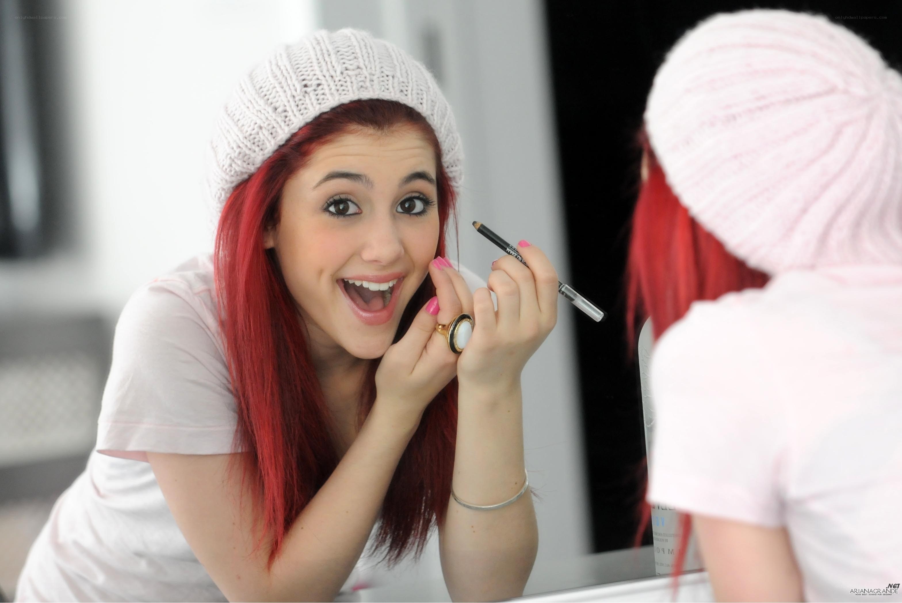 woman applying makeup