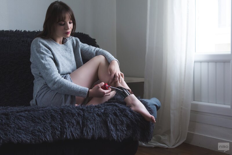 Woman Applying Nail Polish — Gray