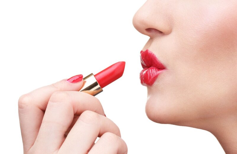 Woman Applying Red Lipstick — Neutral, Photograph