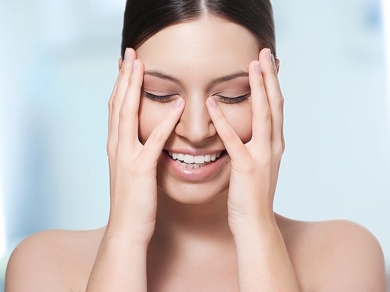Woman Applying Skincare — Blue