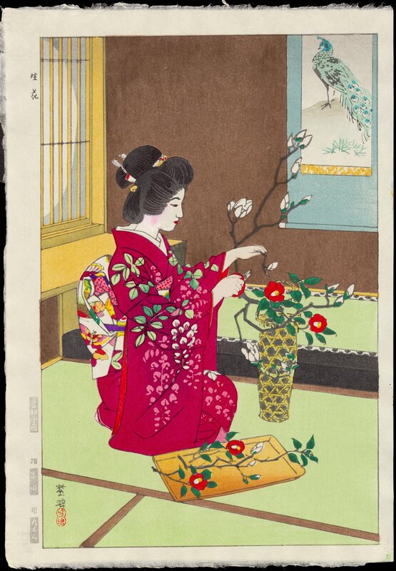 Woman arranging flowers in kimono