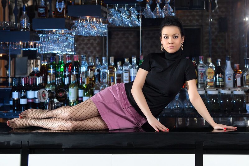 Woman at a bar counter