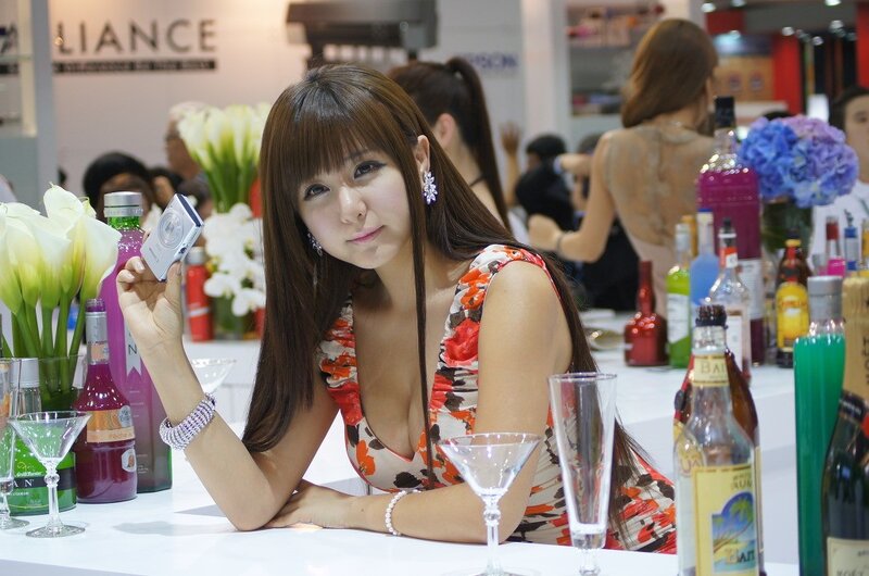 Woman at a beverage booth