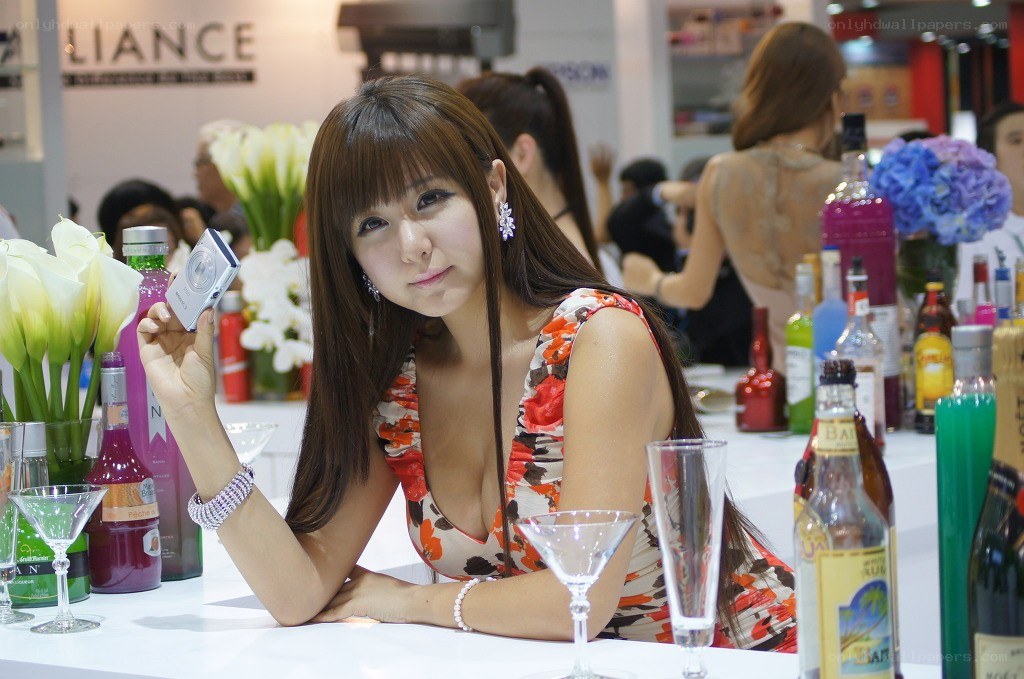 Woman at a beverage booth
