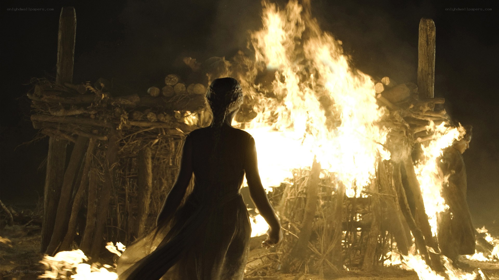 woman at a burning pyre