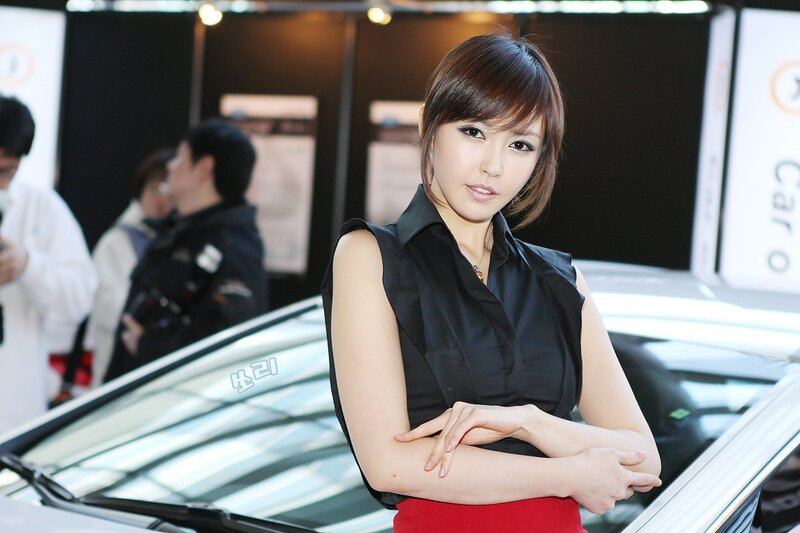 Woman at a car show