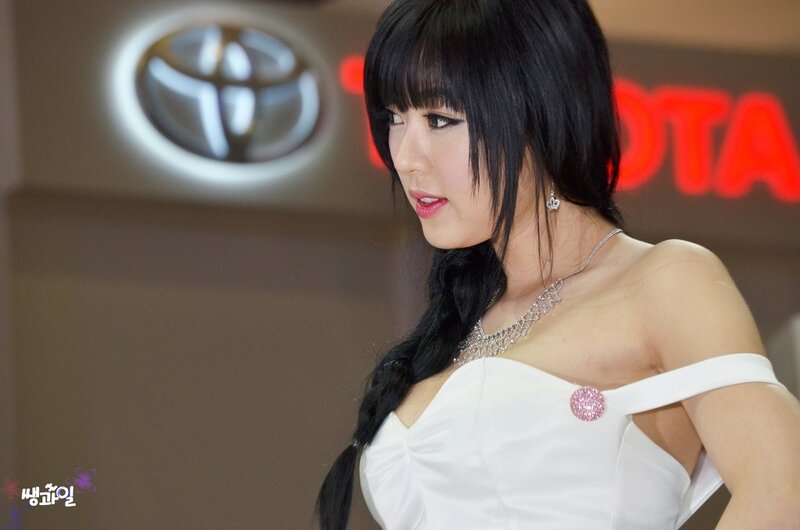 Woman at a car show