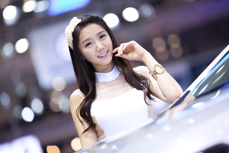 Woman at a car show