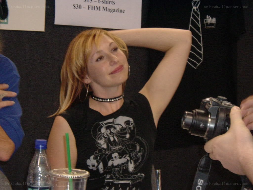 woman at a convention panel