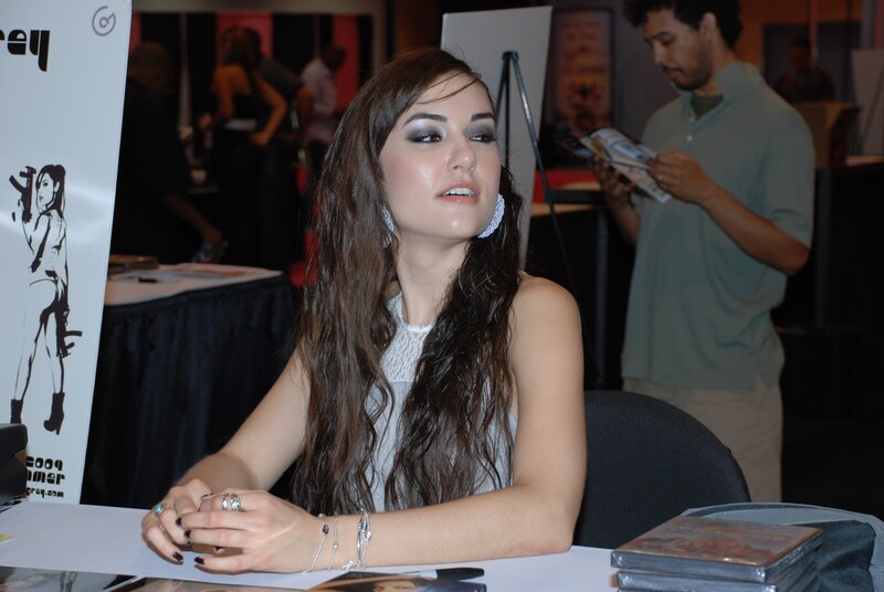 woman at a convention table