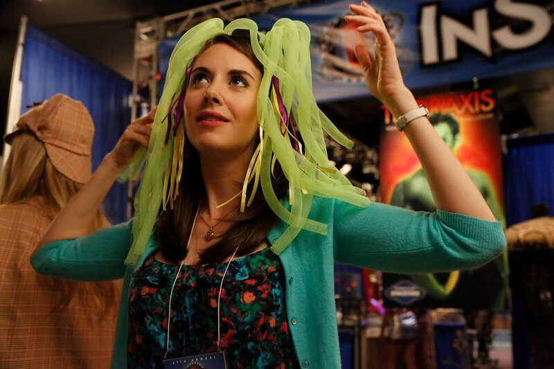 Woman at a convention wearing a wig