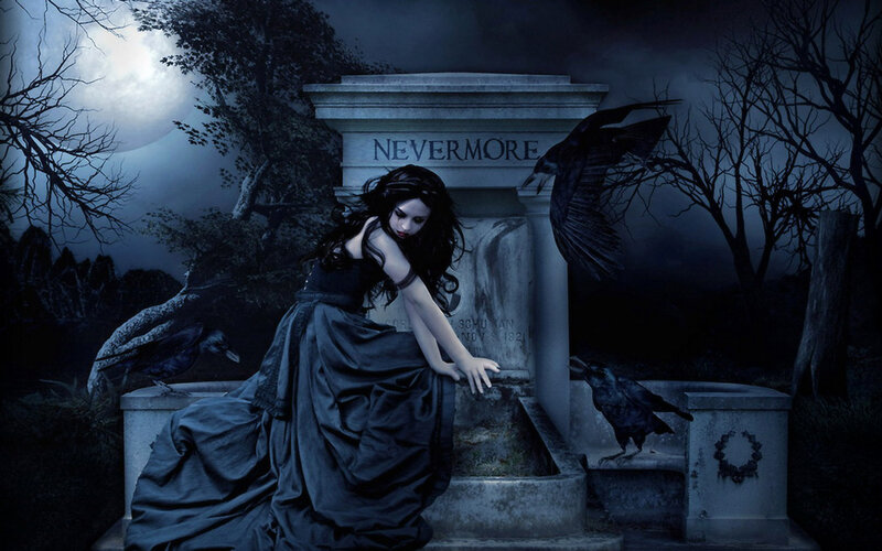 woman at a grave at night