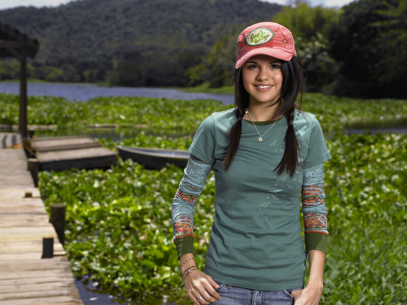 woman at a lake with lily pads