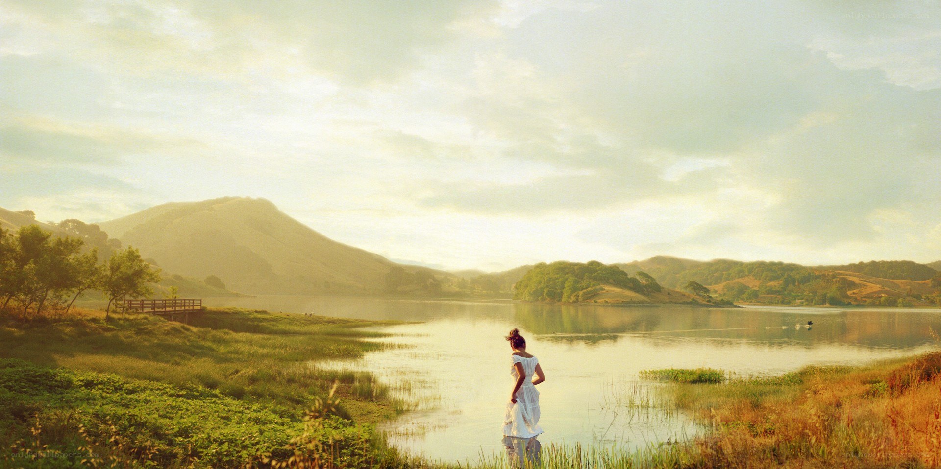 Woman at a lakeside landscape