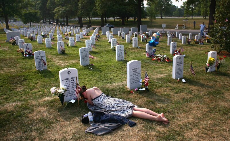 Woman at a military cemetery