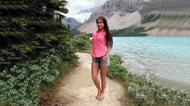 Woman at a mountain lake