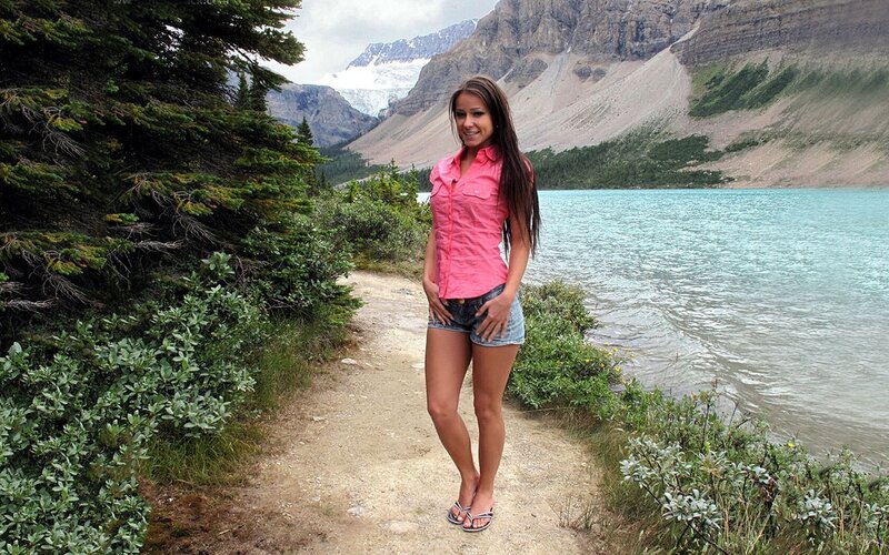 Woman at a mountain lake