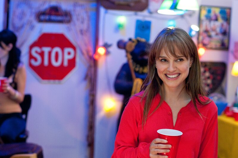 Woman at a party holding cup