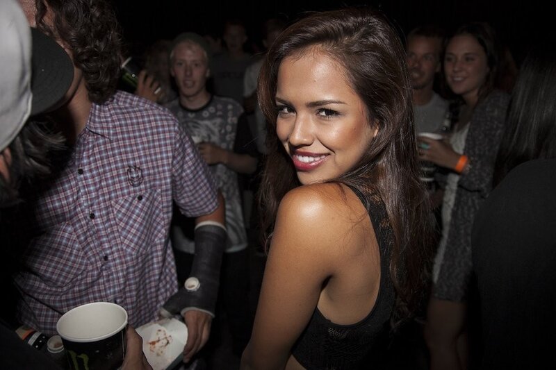 Woman at a party smiling