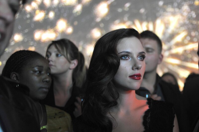 woman at a party with fireworks
