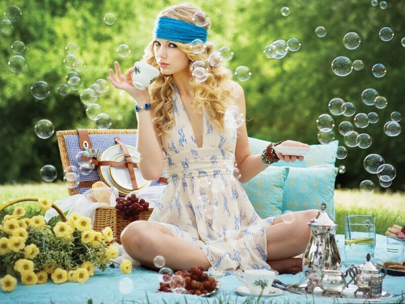 Woman at a picnic with bubbles