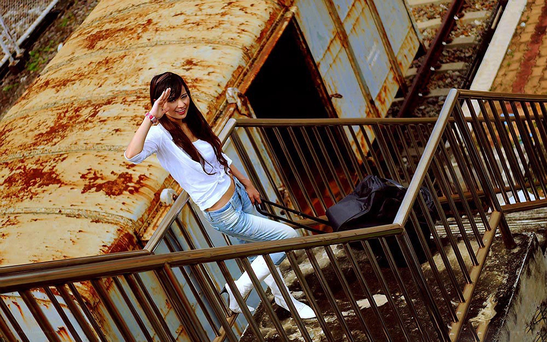 Woman at a rusty train car