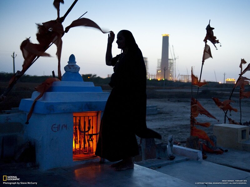 Woman at a shrine near power plant