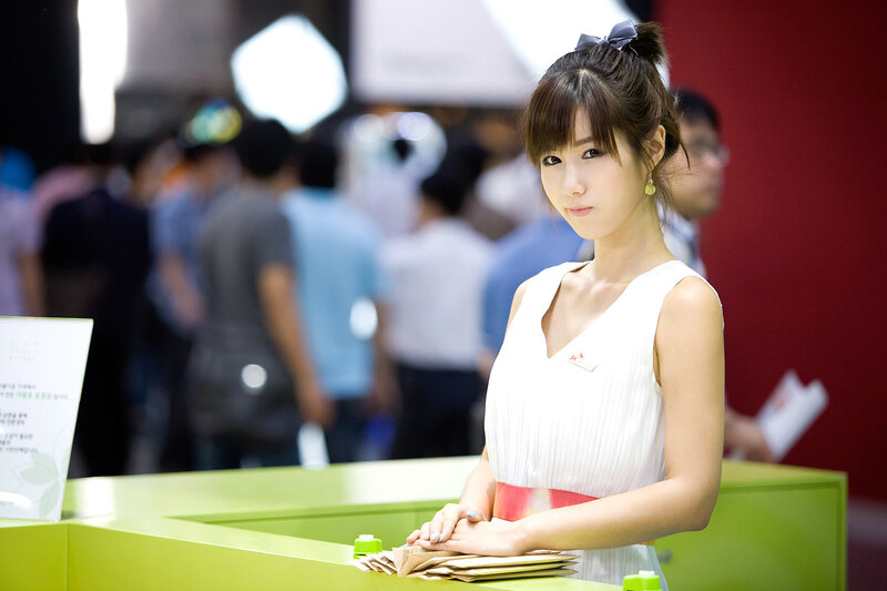 Woman at a trade show booth