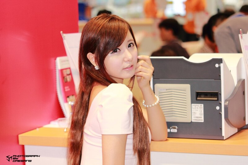 woman at a trade show booth