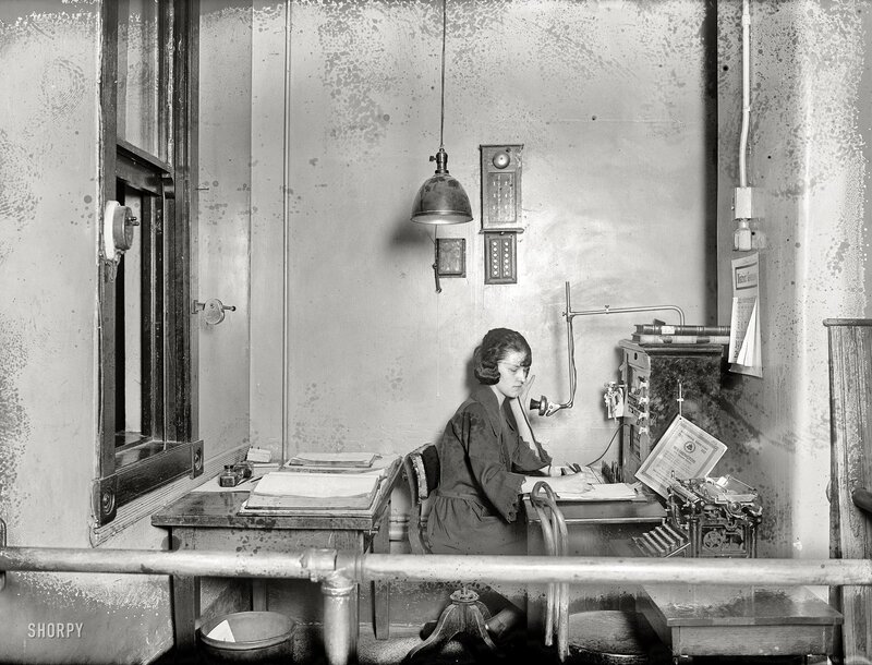 Woman at a vintage office desk