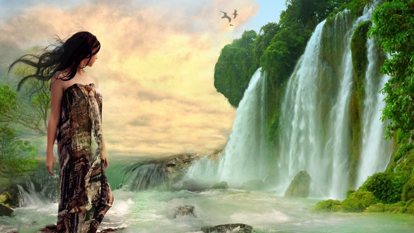 woman at a waterfall